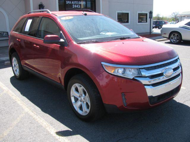 2013 maroon Ford Edge SEL FWD (2FMDK3JCXDB) with an 3.5L V6 DOHC 24V engine, 6-Speed Automatic transmission, located at 2443 Albert Pike, Hot Springs, AR, 71913, (501) 623-6255, 34.492222, -93.109993 - Photo#5