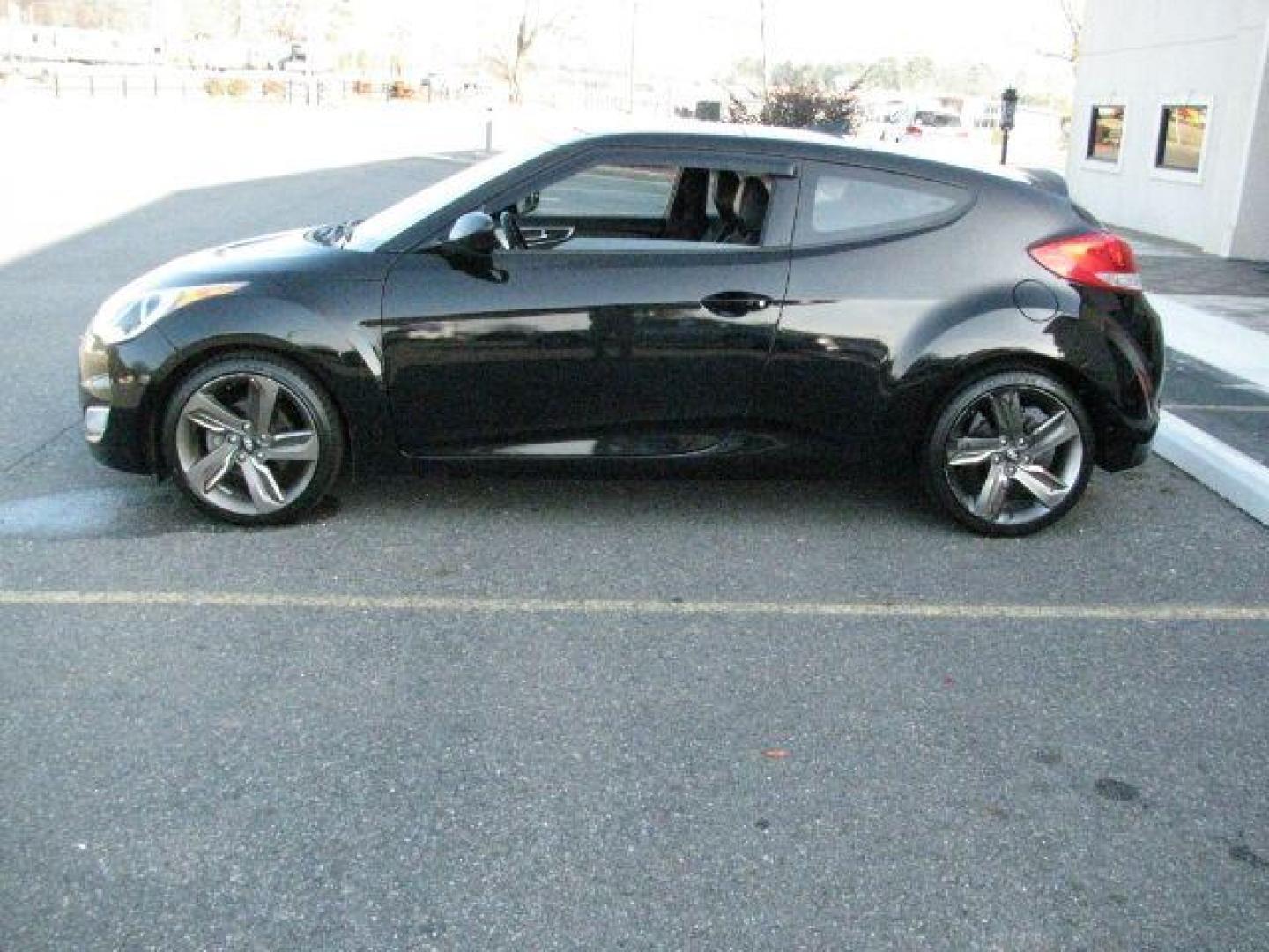 2013 Black Hyundai Veloster Base (KMHTC6AD1DU) with an 1.6L L4 DOHC 16V engine, 6-Speed Automatic transmission, located at 2443 Albert Pike, Hot Springs, AR, 71913, (501) 623-6255, 34.492222, -93.109993 - Photo#1