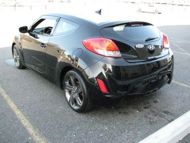 2013 Black Hyundai Veloster Base (KMHTC6AD1DU) with an 1.6L L4 DOHC 16V engine, 6-Speed Automatic transmission, located at 2443 Albert Pike, Hot Springs, AR, 71913, (501) 623-6255, 34.492222, -93.109993 - Photo#2