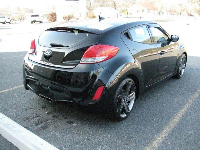 2013 Black Hyundai Veloster Base (KMHTC6AD1DU) with an 1.6L L4 DOHC 16V engine, 6-Speed Automatic transmission, located at 2443 Albert Pike, Hot Springs, AR, 71913, (501) 623-6255, 34.492222, -93.109993 - Photo#3
