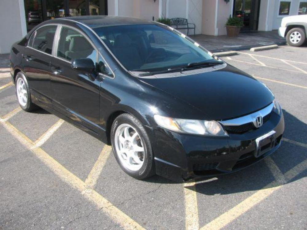 2009 Black Honda Civic LX Sedan 5-Speed AT (1HGFA16579L) with an 1.8L L4 SOHC 16V engine, 5-Speed Automatic transmission, located at 2443 Albert Pike, Hot Springs, AR, 71913, (501) 623-6255, 34.492222, -93.109993 - PRICE $10,995 DOWN $995 PAYMENTS $150 EVERY TWO WEEKS ($325 MONTHLY) INTEREST RATE 9.9% TERM 36 MONTHS W.A.C. - Photo #0