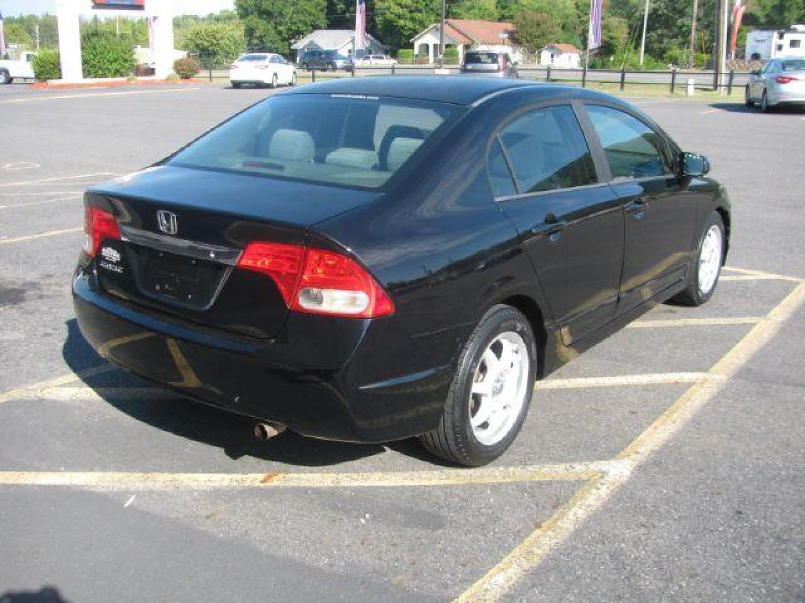 2009 Black Honda Civic LX Sedan 5-Speed AT (1HGFA16579L) with an 1.8L L4 SOHC 16V engine, 5-Speed Automatic transmission, located at 2443 Albert Pike, Hot Springs, AR, 71913, (501) 623-6255, 34.492222, -93.109993 - Photo #2