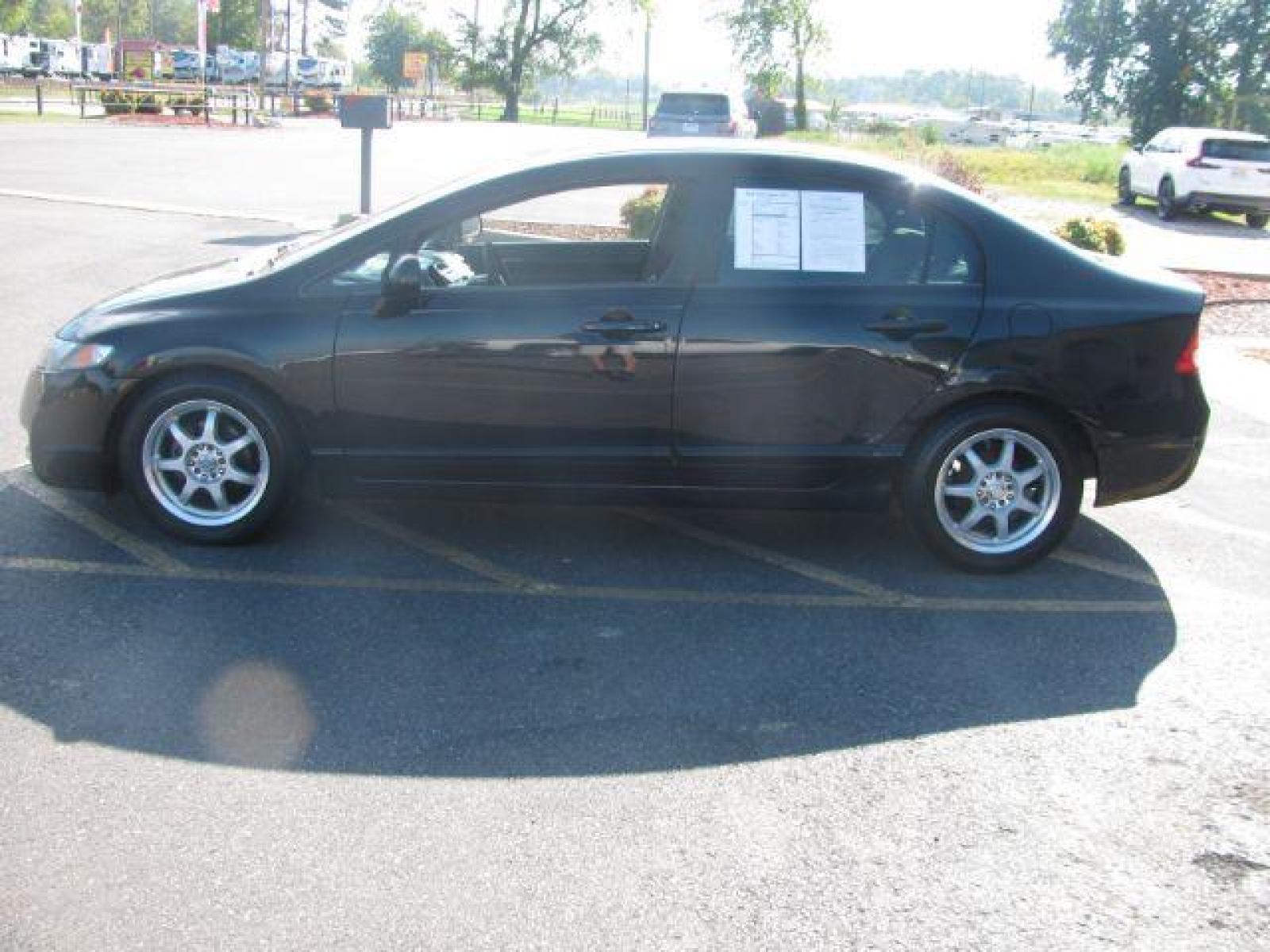 2009 Black Honda Civic LX Sedan 5-Speed AT (1HGFA16579L) with an 1.8L L4 SOHC 16V engine, 5-Speed Automatic transmission, located at 2443 Albert Pike, Hot Springs, AR, 71913, (501) 623-6255, 34.492222, -93.109993 - Photo #4