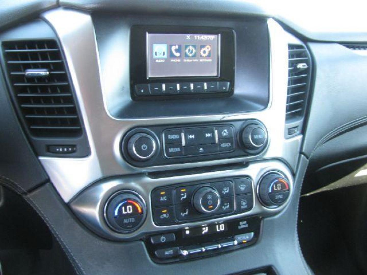 2015 Black Chevrolet Tahoe LS 4WD (1GNSKAKC7FR) with an 5.3L V8 OHV 16V engine, 6-Speed Automatic transmission, located at 2443 Albert Pike, Hot Springs, AR, 71913, (501) 623-6255, 34.492222, -93.109993 - Photo#10
