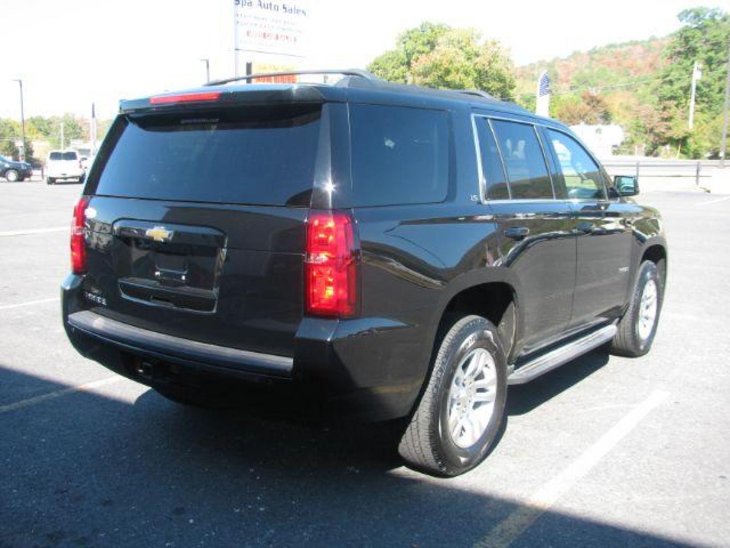 2015 Black Chevrolet Tahoe LS 4WD (1GNSKAKC7FR) with an 5.3L V8 OHV 16V engine, 6-Speed Automatic transmission, located at 2443 Albert Pike, Hot Springs, AR, 71913, (501) 623-6255, 34.492222, -93.109993 - Photo#2