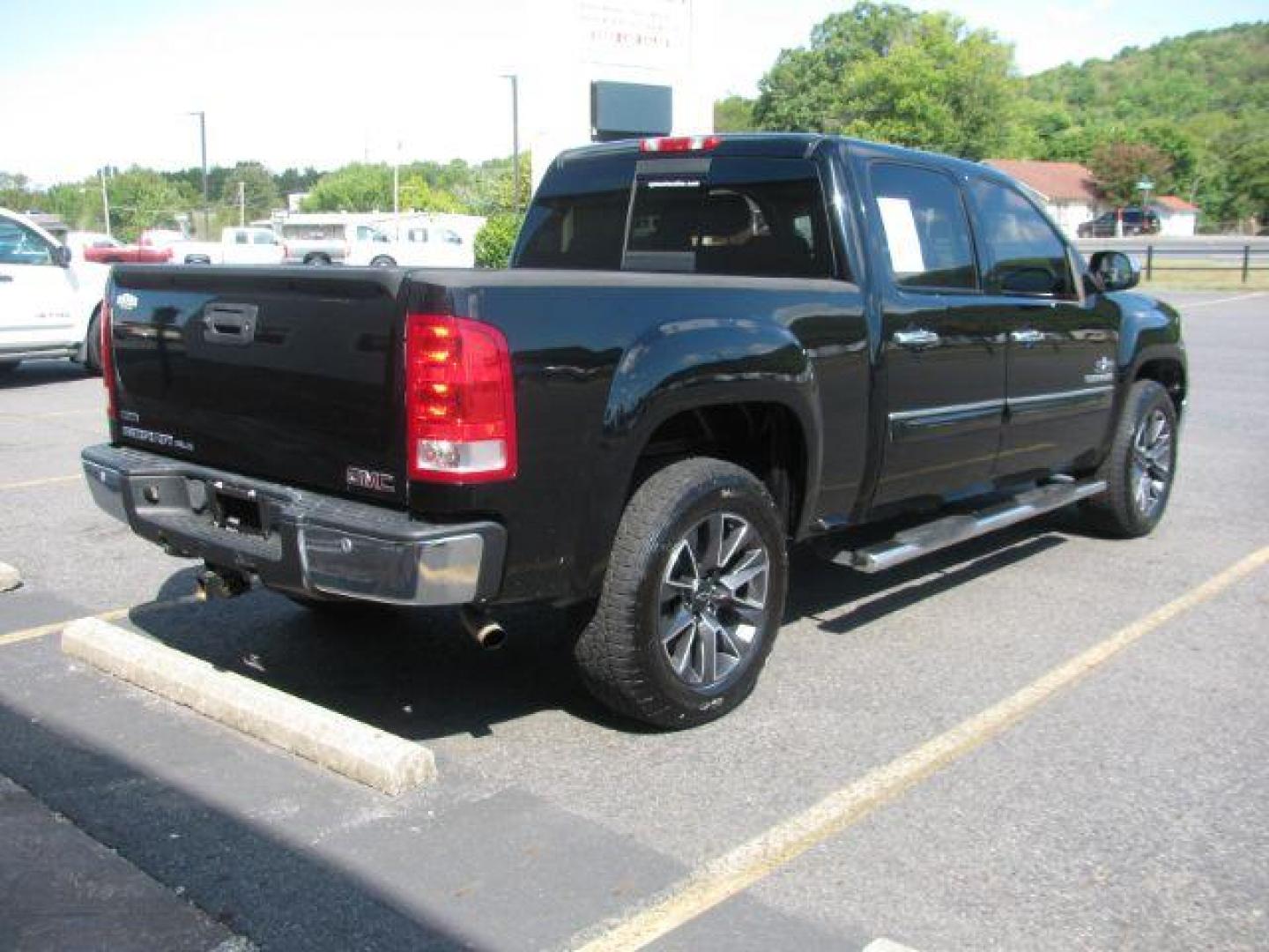 2011 Black GMC Sierra 1500 SLE Crew Cab 2WD (3GTP1VE07BG) with an 5.3L V8 OHV 16V FFV engine, 6-Speed Automatic transmission, located at 2443 Albert Pike, Hot Springs, AR, 71913, (501) 623-6255, 34.492222, -93.109993 - Photo#2