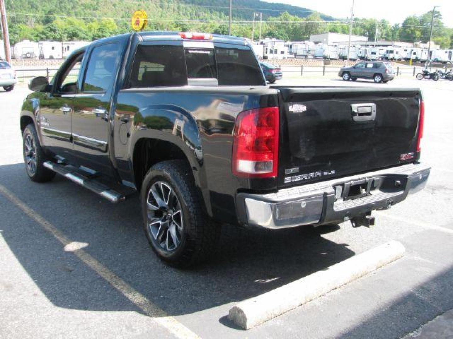 2011 Black GMC Sierra 1500 SLE Crew Cab 2WD (3GTP1VE07BG) with an 5.3L V8 OHV 16V FFV engine, 6-Speed Automatic transmission, located at 2443 Albert Pike, Hot Springs, AR, 71913, (501) 623-6255, 34.492222, -93.109993 - Photo#4