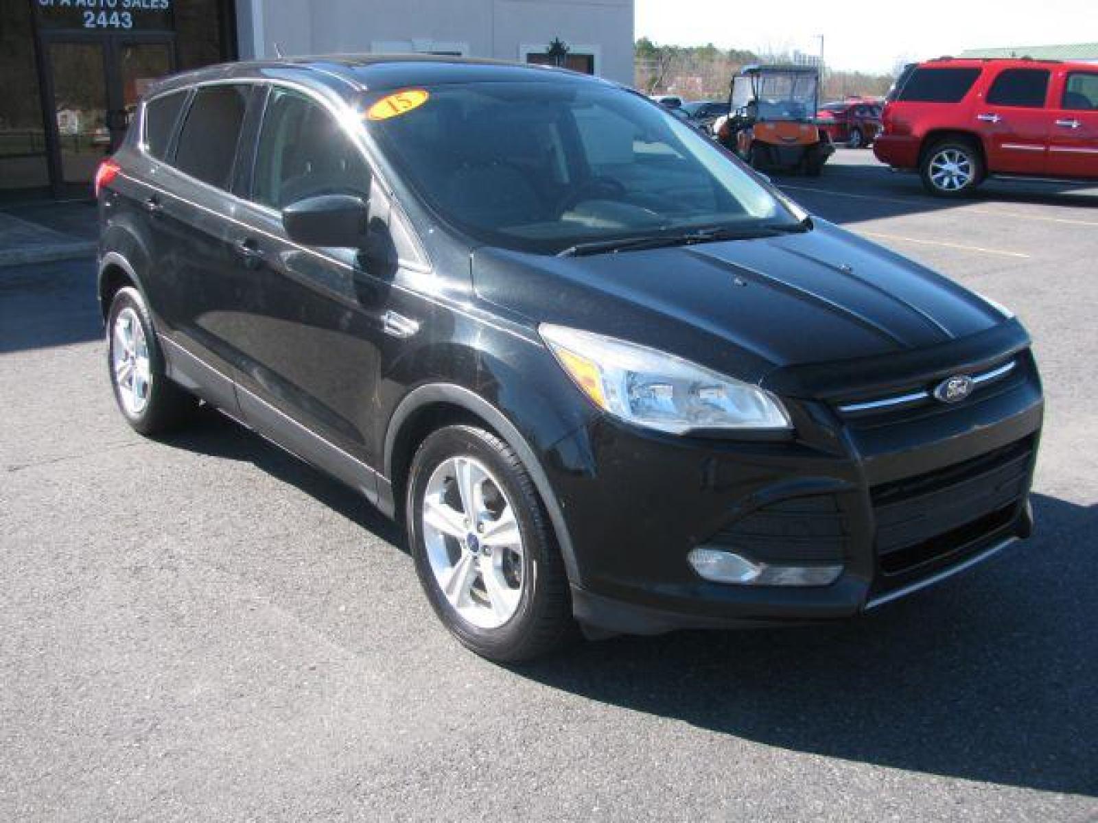 2015 Black Ford Escape SE FWD (1FMCU0G99FU) with an 2.0L L4 DOHC 16V engine, 6-Speed Automatic transmission, located at 2443 Albert Pike, Hot Springs, AR, 71913, (501) 623-6255, 34.492222, -93.109993 - Photo #0
