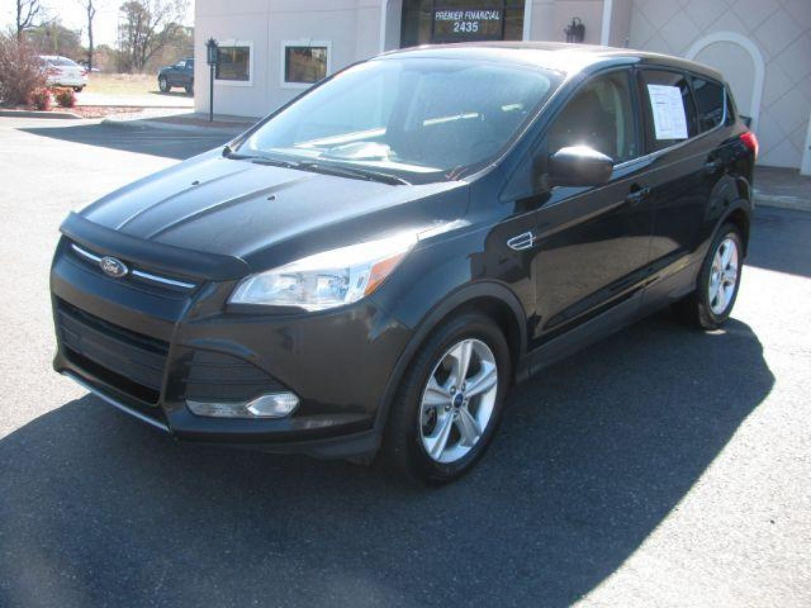 2015 Black Ford Escape SE FWD (1FMCU0G99FU) with an 2.0L L4 DOHC 16V engine, 6-Speed Automatic transmission, located at 2443 Albert Pike, Hot Springs, AR, 71913, (501) 623-6255, 34.492222, -93.109993 - Photo #5