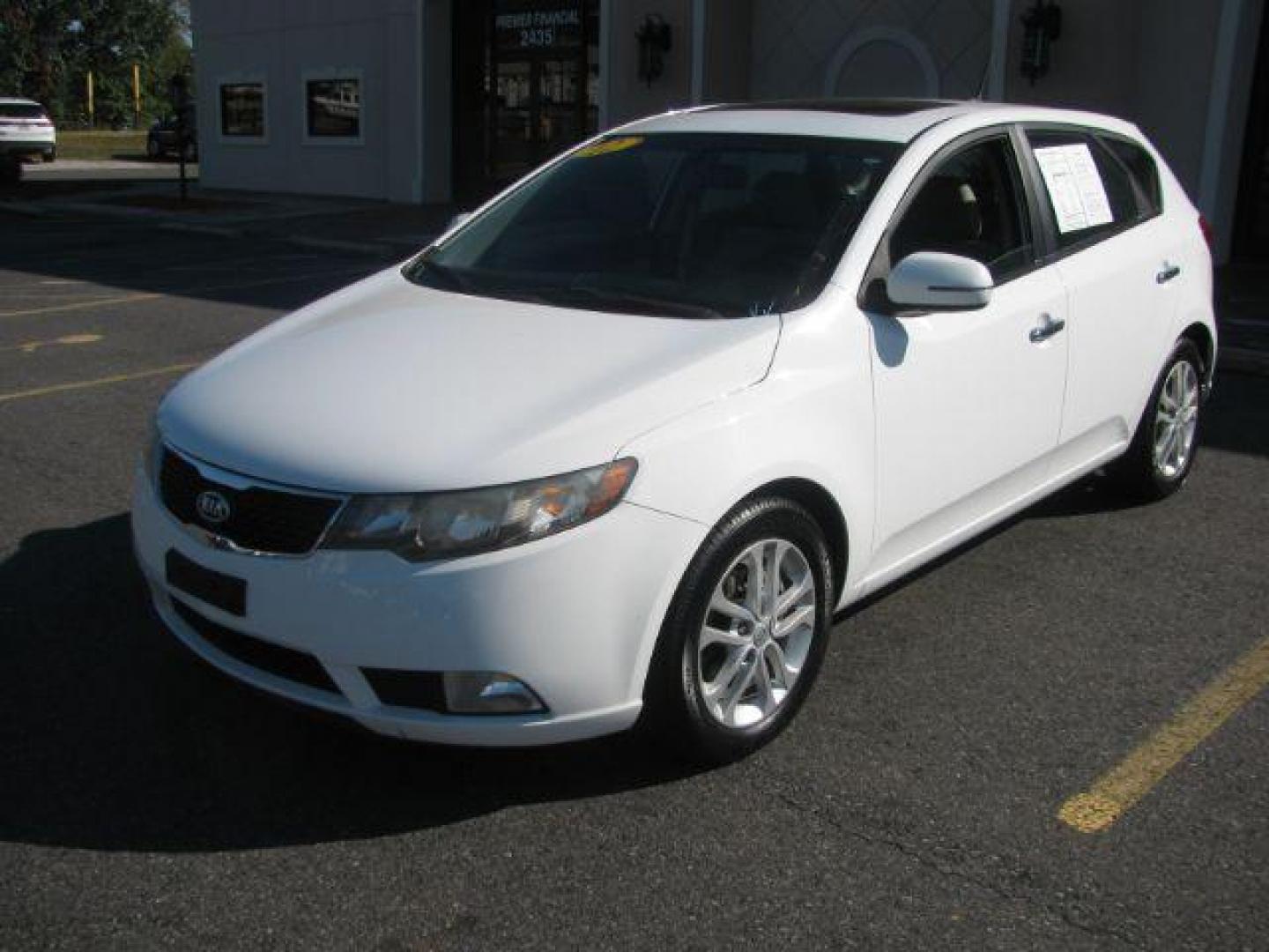 2012 White Kia Forte 5-Door EX (KNAFU5A26C5) with an 2.0L L4 DOHC 16V engine, located at 2443 Albert Pike, Hot Springs, AR, 71913, (501) 623-6255, 34.492222, -93.109993 - LISTED FEATURES MAY BE OPTIONAL AND NOT INCLUDED ON THIS VEHICLE!!! - Photo#0