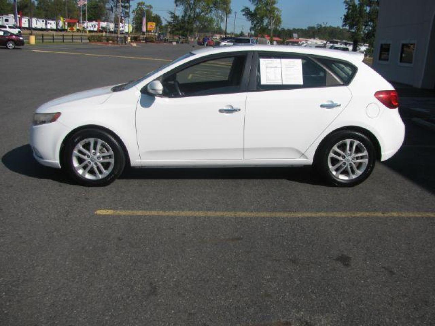 2012 White Kia Forte 5-Door EX (KNAFU5A26C5) with an 2.0L L4 DOHC 16V engine, located at 2443 Albert Pike, Hot Springs, AR, 71913, (501) 623-6255, 34.492222, -93.109993 - LISTED FEATURES MAY BE OPTIONAL AND NOT INCLUDED ON THIS VEHICLE!!! - Photo#1