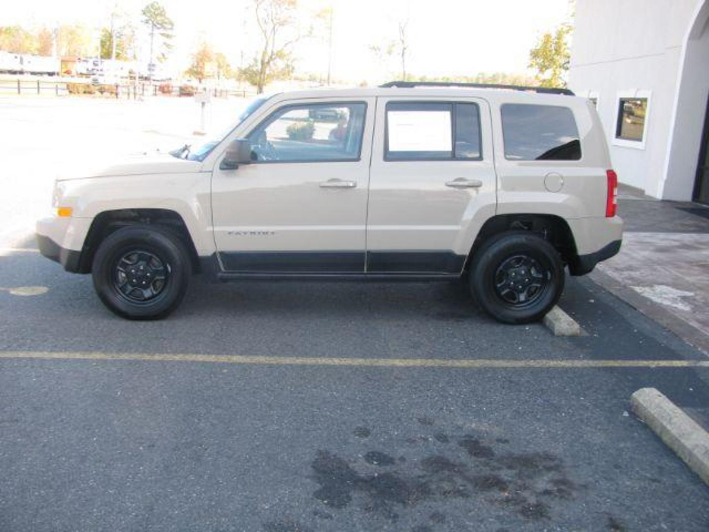 2017 Tan Jeep Patriot Sport 4WD (1C4NJRBB4HD) with an 2.4L L4 DOHC 16V engine, located at 2443 Albert Pike, Hot Springs, AR, 71913, (501) 623-6255, 34.492222, -93.109993 - Photo#1