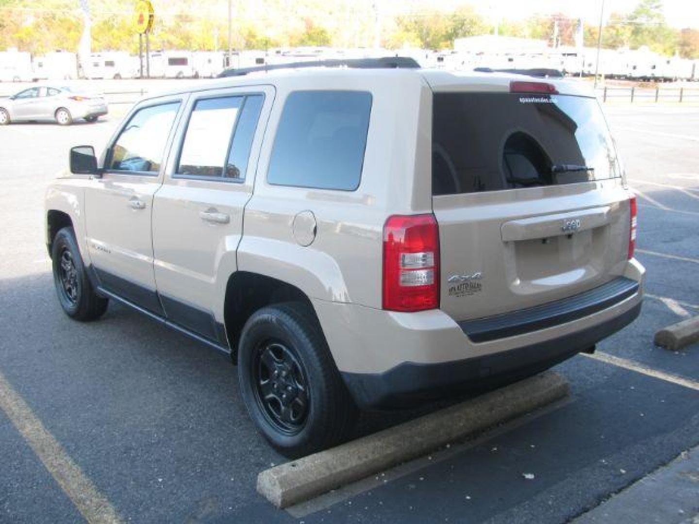 2017 Tan Jeep Patriot Sport 4WD (1C4NJRBB4HD) with an 2.4L L4 DOHC 16V engine, located at 2443 Albert Pike, Hot Springs, AR, 71913, (501) 623-6255, 34.492222, -93.109993 - Photo#2