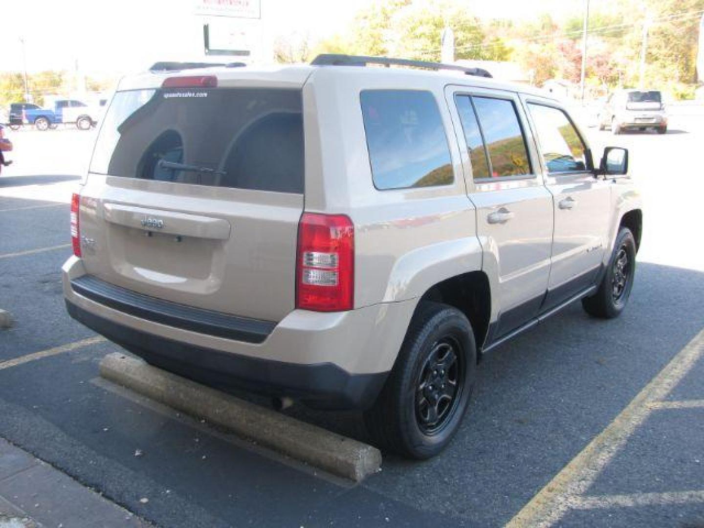 2017 Tan Jeep Patriot Sport 4WD (1C4NJRBB4HD) with an 2.4L L4 DOHC 16V engine, located at 2443 Albert Pike, Hot Springs, AR, 71913, (501) 623-6255, 34.492222, -93.109993 - Photo#3
