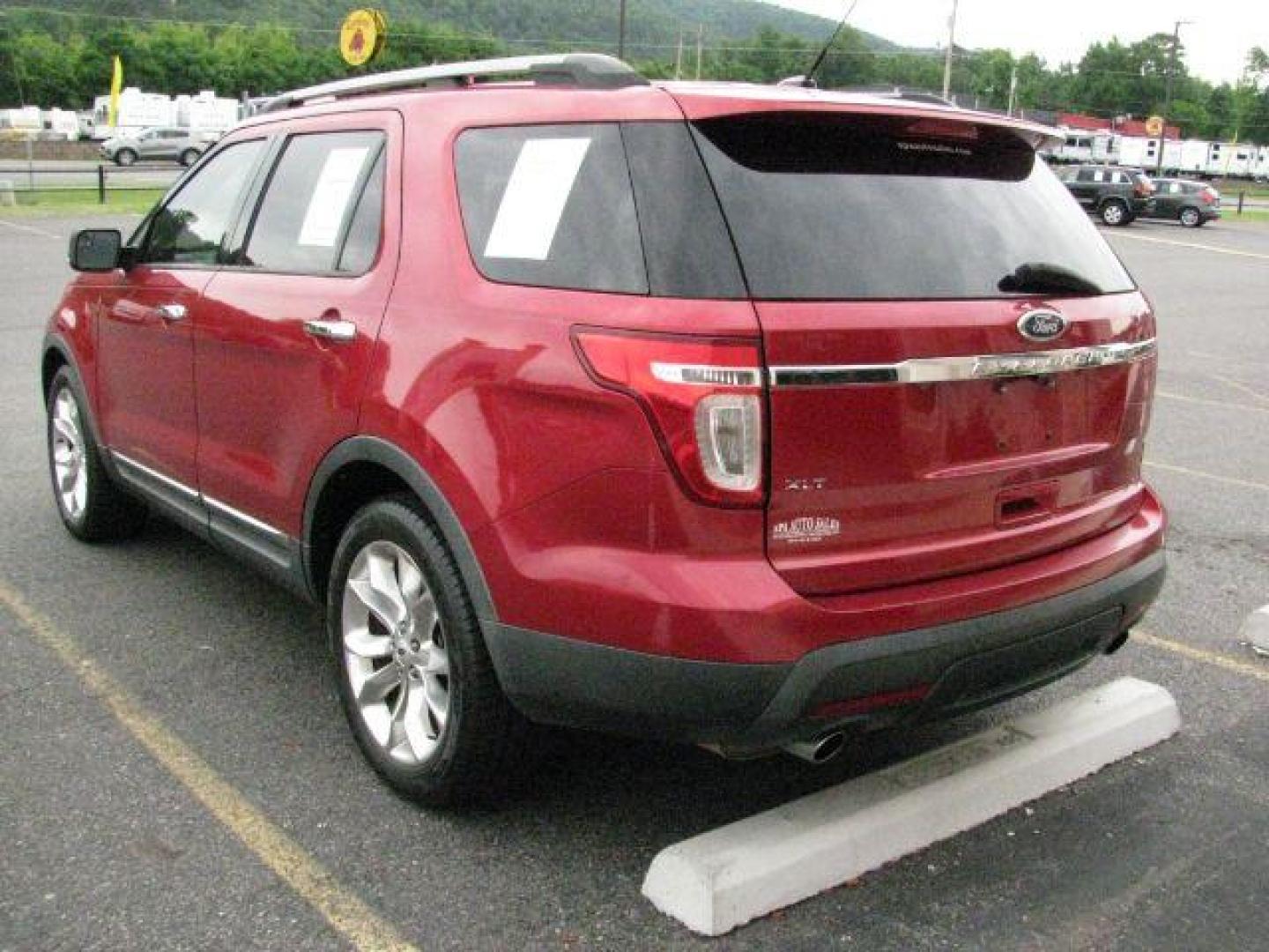 2012 Maroon Ford Explorer XLT FWD (1FMHK7D85CG) with an 3.5L V6 DOHC 24V engine, 6-Speed Automatic transmission, located at 2443 Albert Pike, Hot Springs, AR, 71913, (501) 623-6255, 34.492222, -93.109993 - LISTED FEATURES MAY BE OPTIONAL AND NOT INCLUDED ON THIS VEHICLE!!!- Photo#2