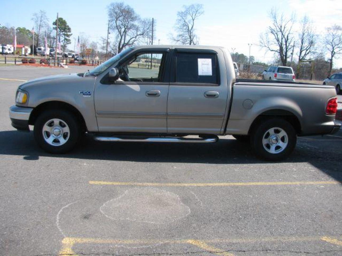 2002 Tan Ford F-150 XLT SuperCrew Short Bed 2WD (1FTRW07642K) with an 4.6L V8 SOHC 16V engine, 4-Speed Automatic transmission, located at 2443 Albert Pike, Hot Springs, AR, 71913, (501) 623-6255, 34.492222, -93.109993 - Photo#1