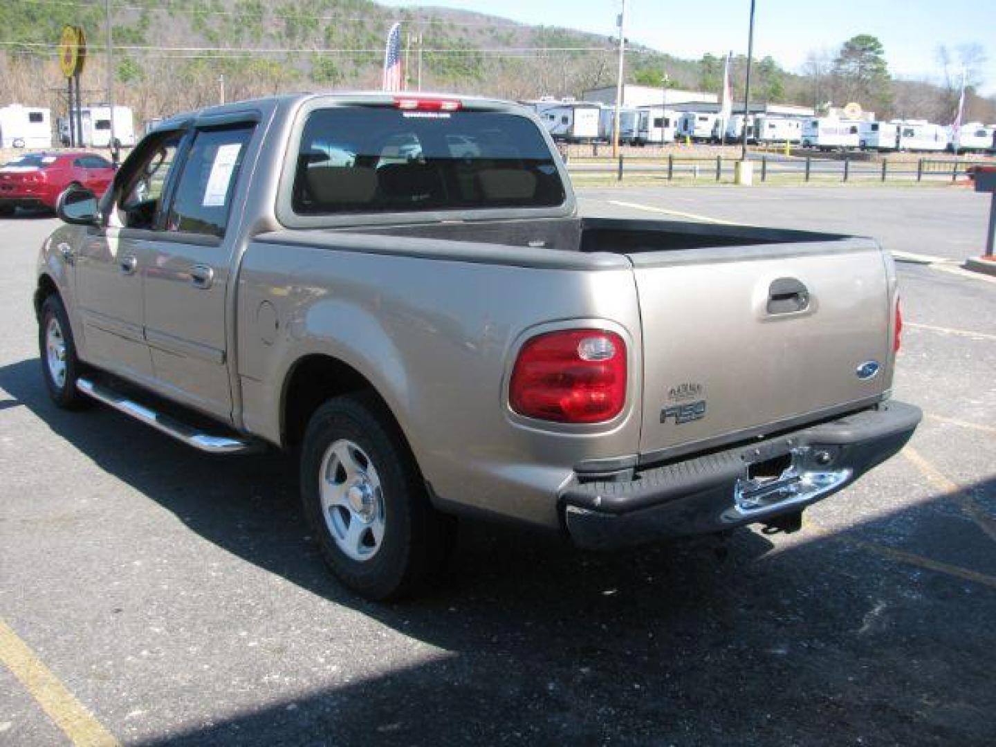 2002 Tan Ford F-150 XLT SuperCrew Short Bed 2WD (1FTRW07642K) with an 4.6L V8 SOHC 16V engine, 4-Speed Automatic transmission, located at 2443 Albert Pike, Hot Springs, AR, 71913, (501) 623-6255, 34.492222, -93.109993 - Photo#2