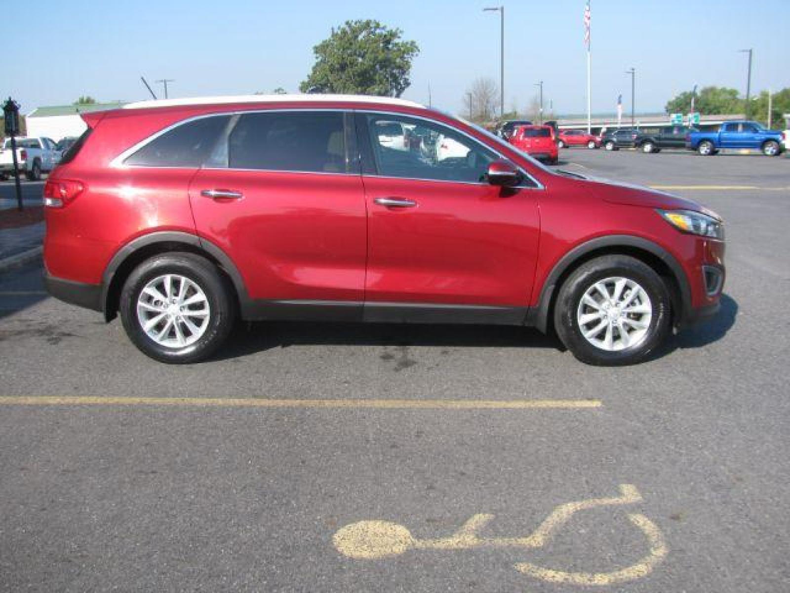 2017 Maroon Kia Sorento LX 2WD (5XYPG4A3XHG) with an 2.4L L4 DOHC 16V engine, 6-Speed Automatic transmission, located at 2443 Albert Pike, Hot Springs, AR, 71913, (501) 623-6255, 34.492222, -93.109993 - LISTED FEATURES MAY BE OPTIONAL AND NOT INCLUDED ON THIS VEHICLE!!! - Photo #1