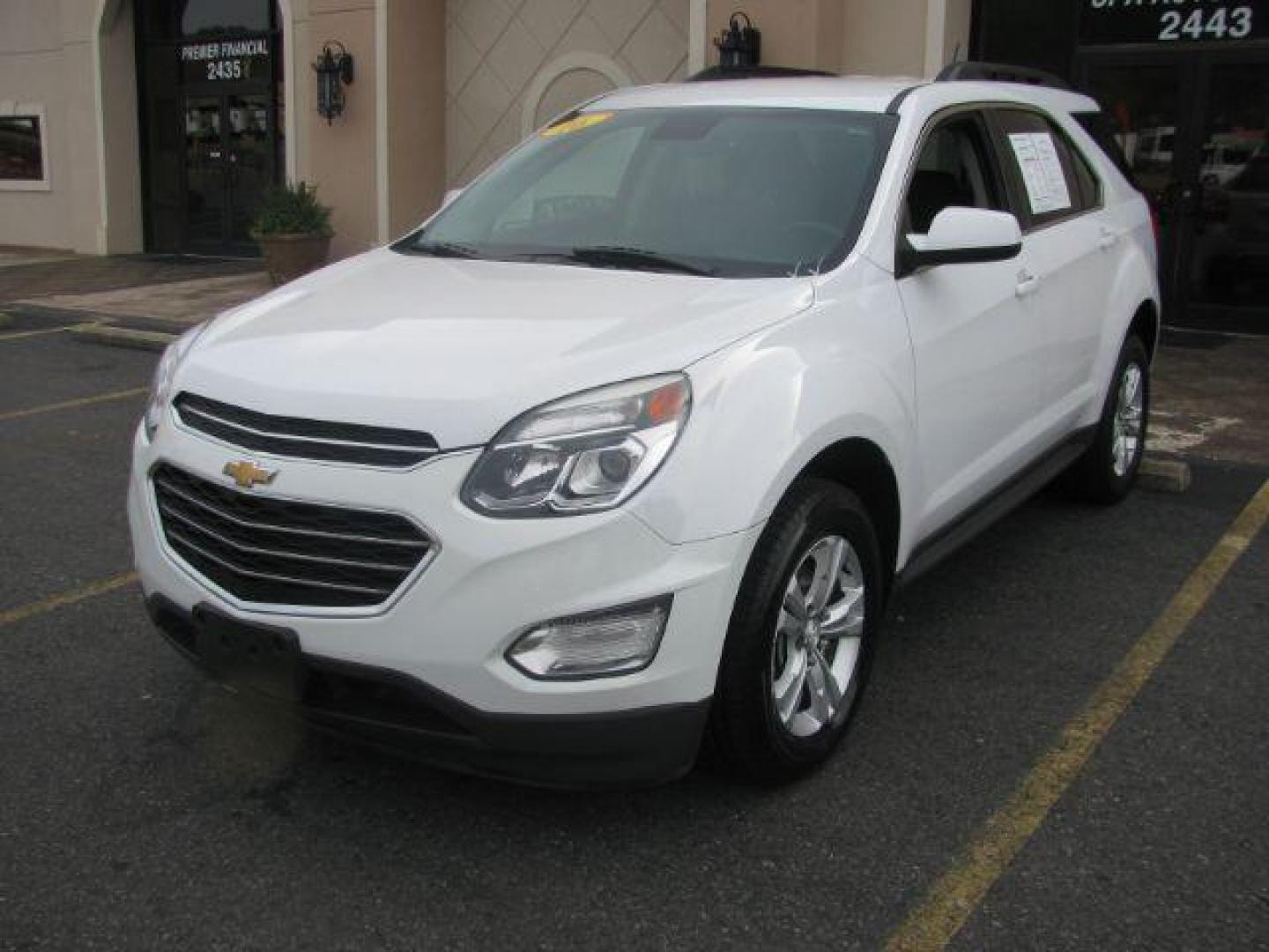 2016 White Chevrolet Equinox LT 2WD (2GNALCEKXG6) with an 2.4L L4 DOHC 16V FFV engine, 6-Speed Automatic transmission, located at 2443 Albert Pike, Hot Springs, AR, 71913, (501) 623-6255, 34.492222, -93.109993 - LISTED FEATURES MAY BE OPTIONAL AND NOT INCLUDED ON THIS VEHICLE!!! - Photo#0