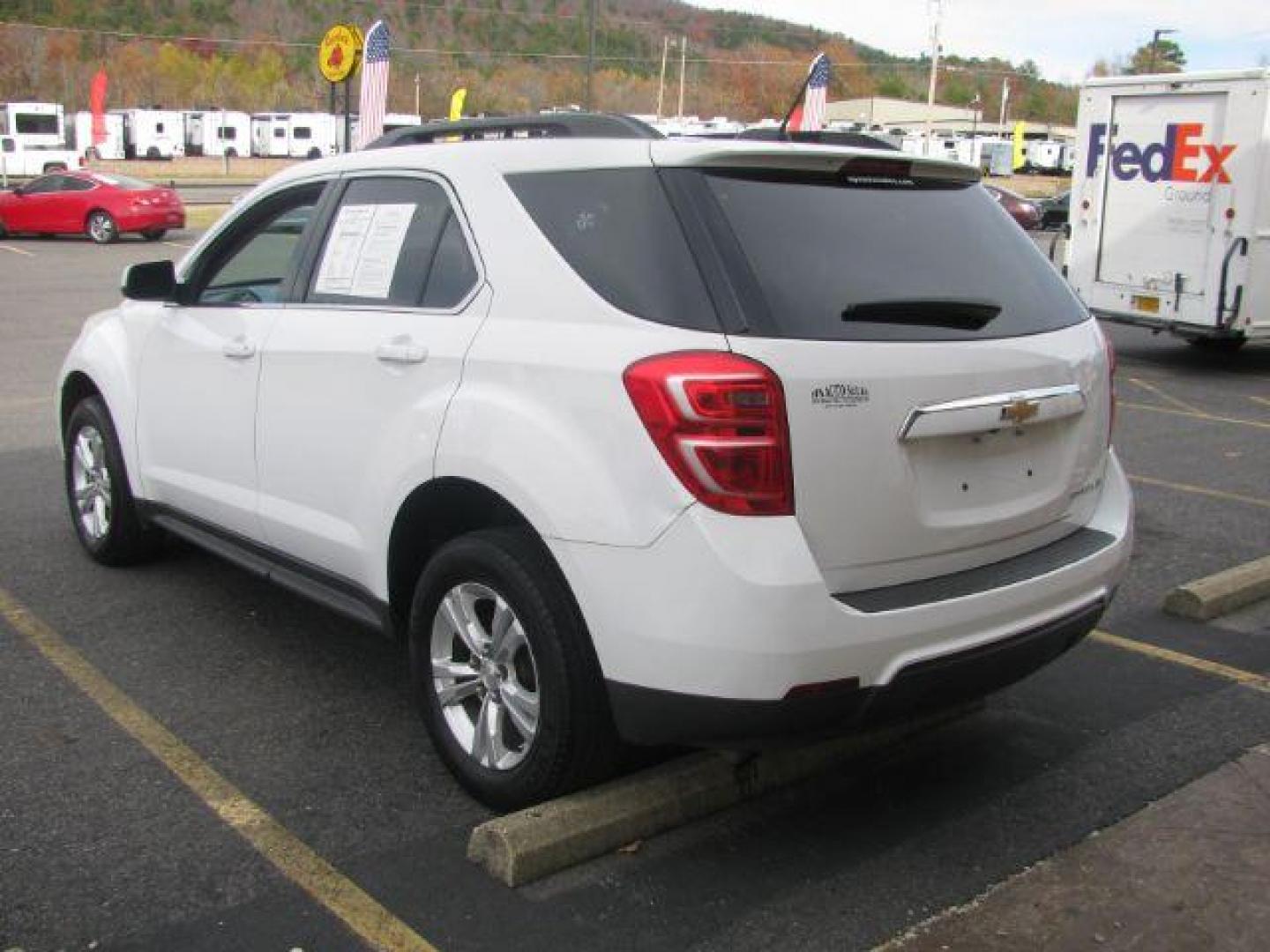2016 White Chevrolet Equinox LT 2WD (2GNALCEKXG6) with an 2.4L L4 DOHC 16V FFV engine, 6-Speed Automatic transmission, located at 2443 Albert Pike, Hot Springs, AR, 71913, (501) 623-6255, 34.492222, -93.109993 - LISTED FEATURES MAY BE OPTIONAL AND NOT INCLUDED ON THIS VEHICLE!!! - Photo#2