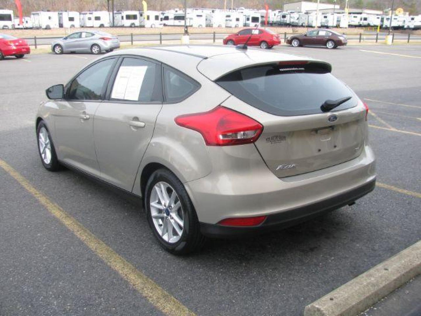 2016 Beige Ford Focus SE Hatch (1FADP3K25GL) with an 2.0L L4 DOHC 16V engine, located at 2443 Albert Pike, Hot Springs, AR, 71913, (501) 623-6255, 34.492222, -93.109993 - LISTED FEATURES MAY BE OPTIONAL AND NOT INCLUDED ON THIS VEHICLE!!! - Photo#2