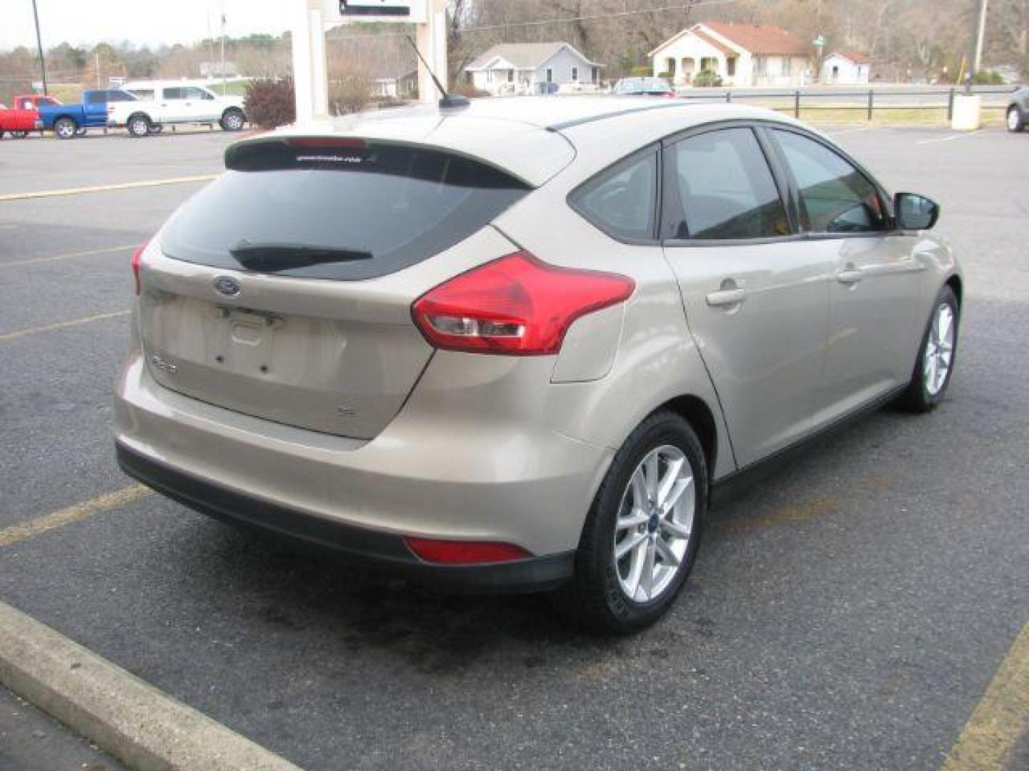 2016 Beige Ford Focus SE Hatch (1FADP3K25GL) with an 2.0L L4 DOHC 16V engine, located at 2443 Albert Pike, Hot Springs, AR, 71913, (501) 623-6255, 34.492222, -93.109993 - LISTED FEATURES MAY BE OPTIONAL AND NOT INCLUDED ON THIS VEHICLE!!! - Photo#3