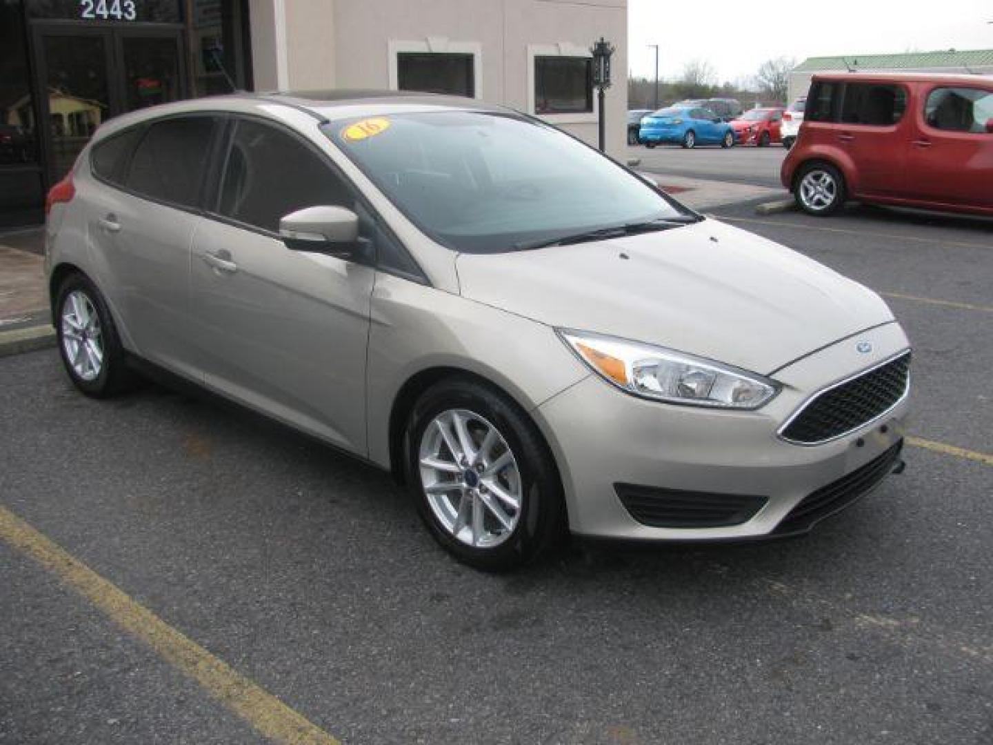 2016 Beige Ford Focus SE Hatch (1FADP3K25GL) with an 2.0L L4 DOHC 16V engine, located at 2443 Albert Pike, Hot Springs, AR, 71913, (501) 623-6255, 34.492222, -93.109993 - LISTED FEATURES MAY BE OPTIONAL AND NOT INCLUDED ON THIS VEHICLE!!! - Photo#5