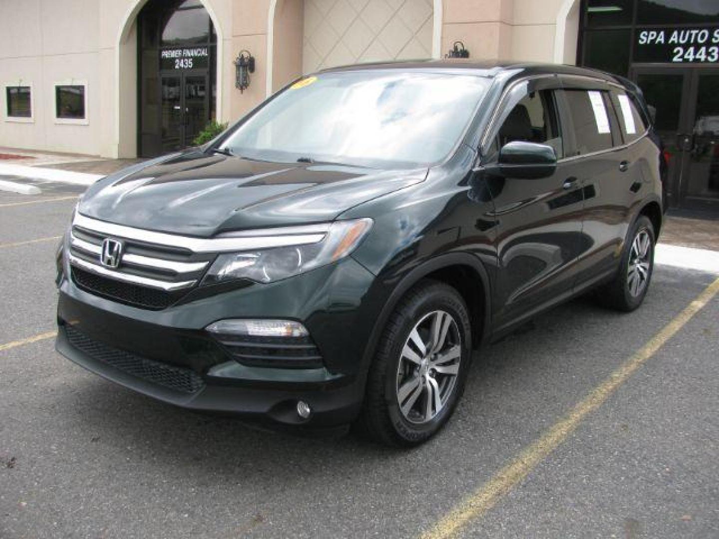 2016 Green Honda Pilot EXL 2WD (5FNYF5H59GB) with an 3.5L V6 SOHC 24V engine, 6-Speed Automatic transmission, located at 2443 Albert Pike, Hot Springs, AR, 71913, (501) 623-6255, 34.492222, -93.109993 - LISTED FEATURES MAY BE OPTIONAL AND NOT INCLUDED ON THIS VEHICLE!!! - Photo#0