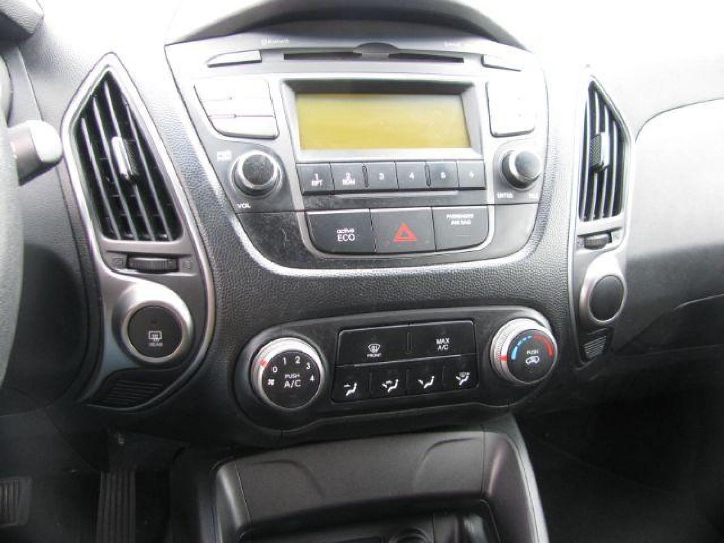 2015 Black Hyundai Tucson GLS FWD (KM8JT3AF3FU) with an 2.0L L4 DOHC 16V engine, 6-Speed Automatic transmission, located at 2443 Albert Pike, Hot Springs, AR, 71913, (501) 623-6255, 34.492222, -93.109993 - LISTED FEATURES MAY BE OPTIONAL AND NOT INCLUDED ON THIS VEHICLE!!! - Photo#9