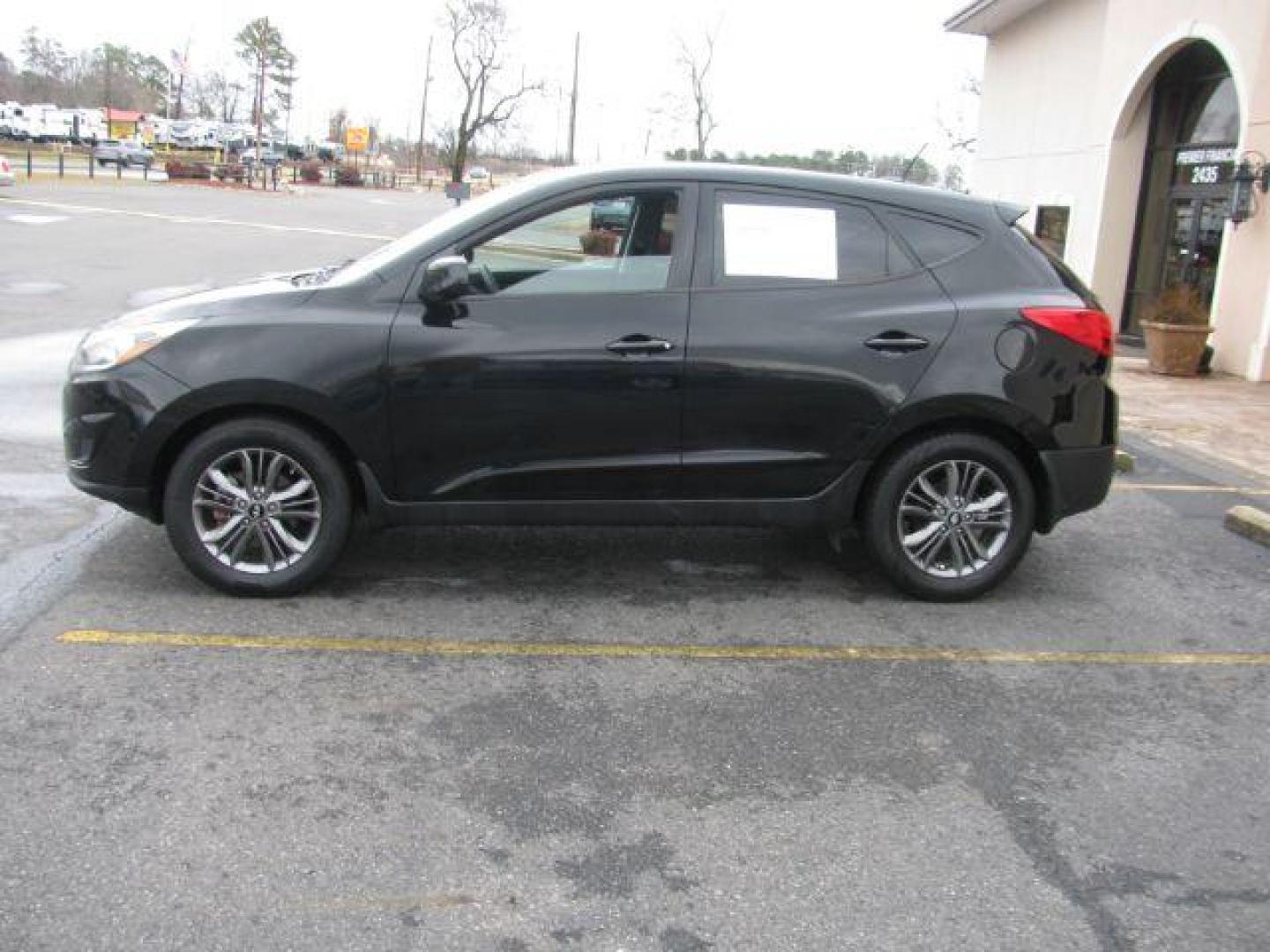 2015 Black Hyundai Tucson GLS FWD (KM8JT3AF3FU) with an 2.0L L4 DOHC 16V engine, 6-Speed Automatic transmission, located at 2443 Albert Pike, Hot Springs, AR, 71913, (501) 623-6255, 34.492222, -93.109993 - LISTED FEATURES MAY BE OPTIONAL AND NOT INCLUDED ON THIS VEHICLE!!! - Photo#1