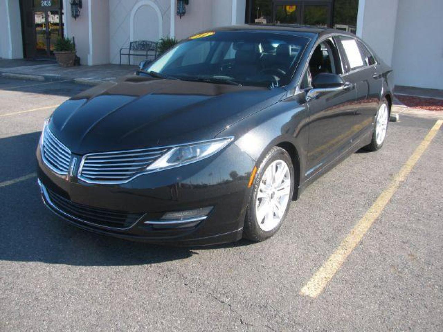 2014 Black Lincoln MKZ FWD (3LN6L2GK8ER) with an 3.7L V6 DOHC 24V engine, 6-Speed Automatic transmission, located at 2443 Albert Pike, Hot Springs, AR, 71913, (501) 623-6255, 34.492222, -93.109993 - LISTED FEATURES MAY BE OPTIONAL AND NOT INCLUDED ON THIS VEHICLE!!! - Photo#0