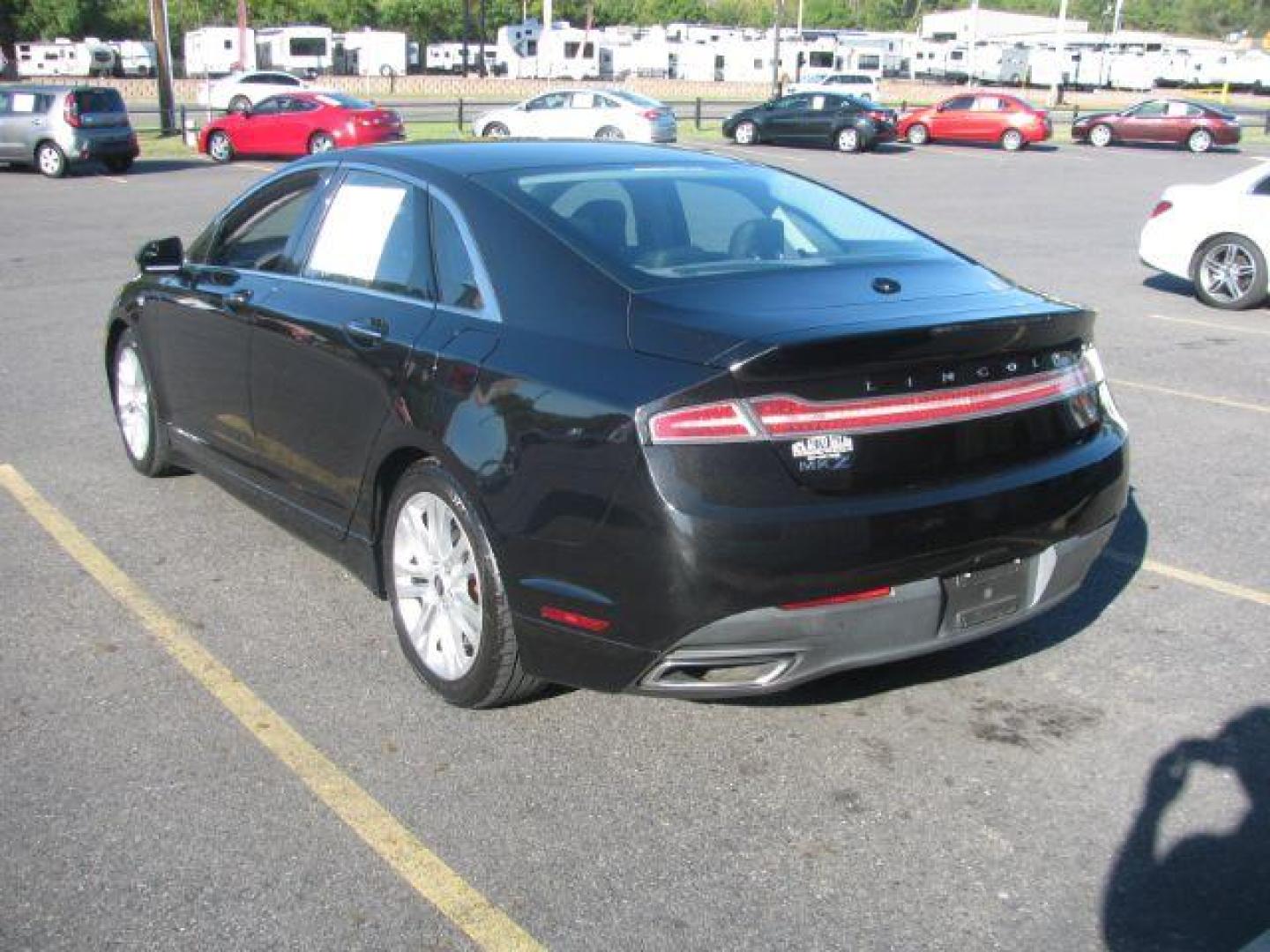 2014 Black Lincoln MKZ FWD (3LN6L2GK8ER) with an 3.7L V6 DOHC 24V engine, 6-Speed Automatic transmission, located at 2443 Albert Pike, Hot Springs, AR, 71913, (501) 623-6255, 34.492222, -93.109993 - LISTED FEATURES MAY BE OPTIONAL AND NOT INCLUDED ON THIS VEHICLE!!! - Photo#2