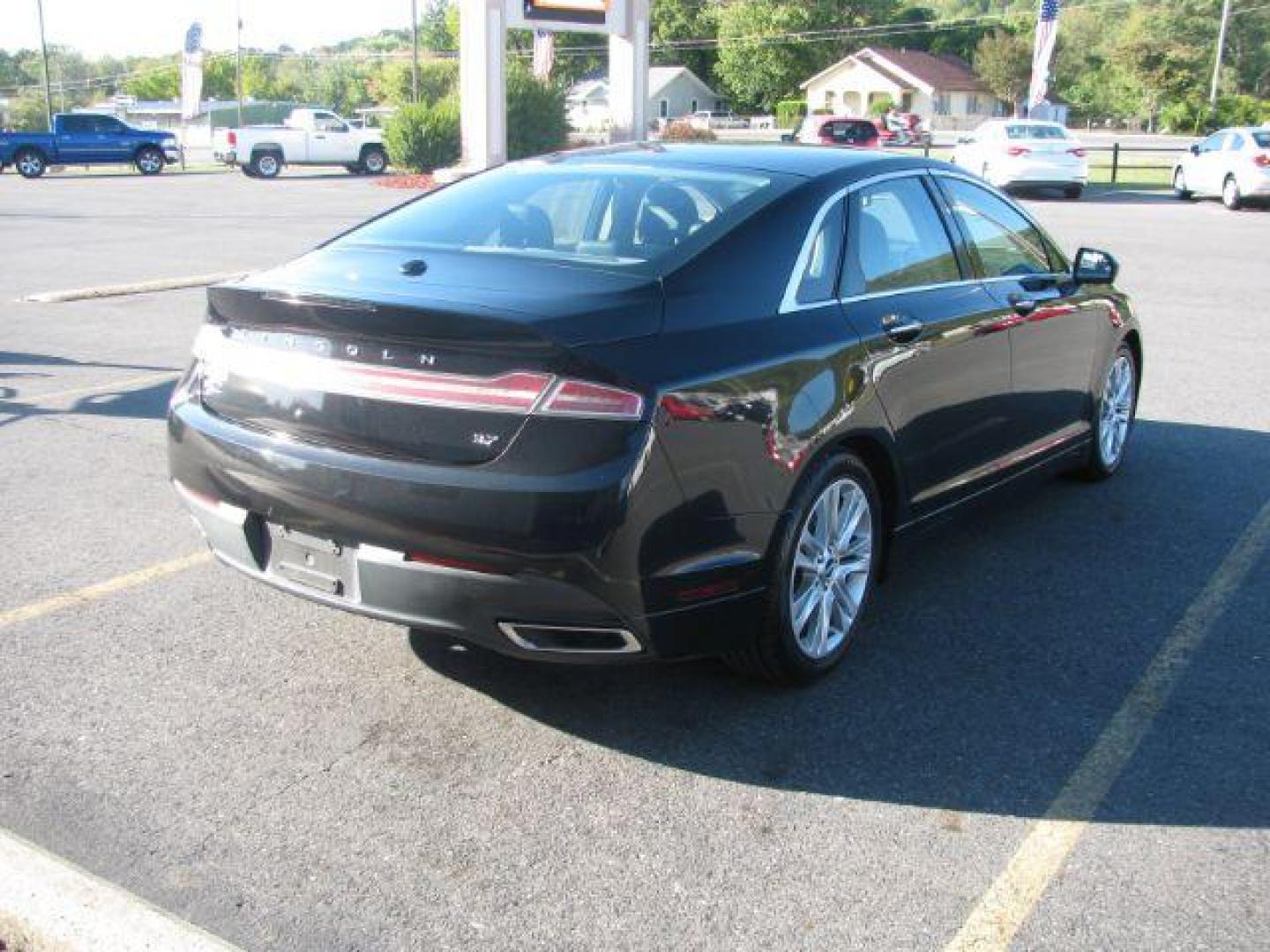 2014 Black Lincoln MKZ FWD (3LN6L2GK8ER) with an 3.7L V6 DOHC 24V engine, 6-Speed Automatic transmission, located at 2443 Albert Pike, Hot Springs, AR, 71913, (501) 623-6255, 34.492222, -93.109993 - LISTED FEATURES MAY BE OPTIONAL AND NOT INCLUDED ON THIS VEHICLE!!! - Photo#3