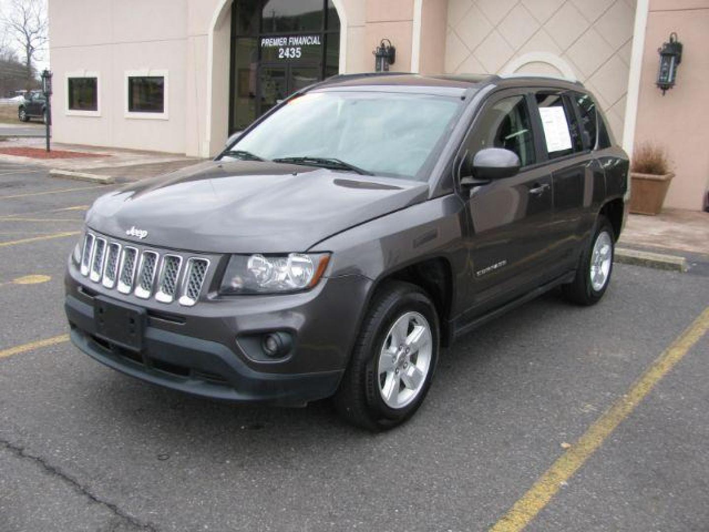 2016 Gray Jeep Compass Latitude FWD (1C4NJCEA1GD) with an 2.0L L4 DOHC 16V engine, Continuously Variable Transmission transmission, located at 2443 Albert Pike, Hot Springs, AR, 71913, (501) 623-6255, 34.492222, -93.109993 - LISTED FEATURES MAY BE OPTIONAL AND NOT INCLUDED ON THIS VEHICLE!!! - Photo#0