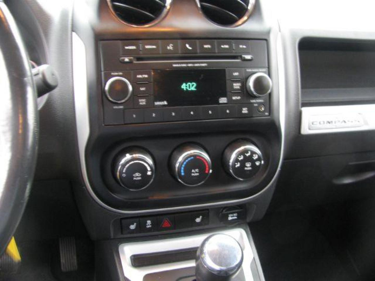 2016 Gray Jeep Compass Latitude FWD (1C4NJCEA1GD) with an 2.0L L4 DOHC 16V engine, Continuously Variable Transmission transmission, located at 2443 Albert Pike, Hot Springs, AR, 71913, (501) 623-6255, 34.492222, -93.109993 - LISTED FEATURES MAY BE OPTIONAL AND NOT INCLUDED ON THIS VEHICLE!!! - Photo#9