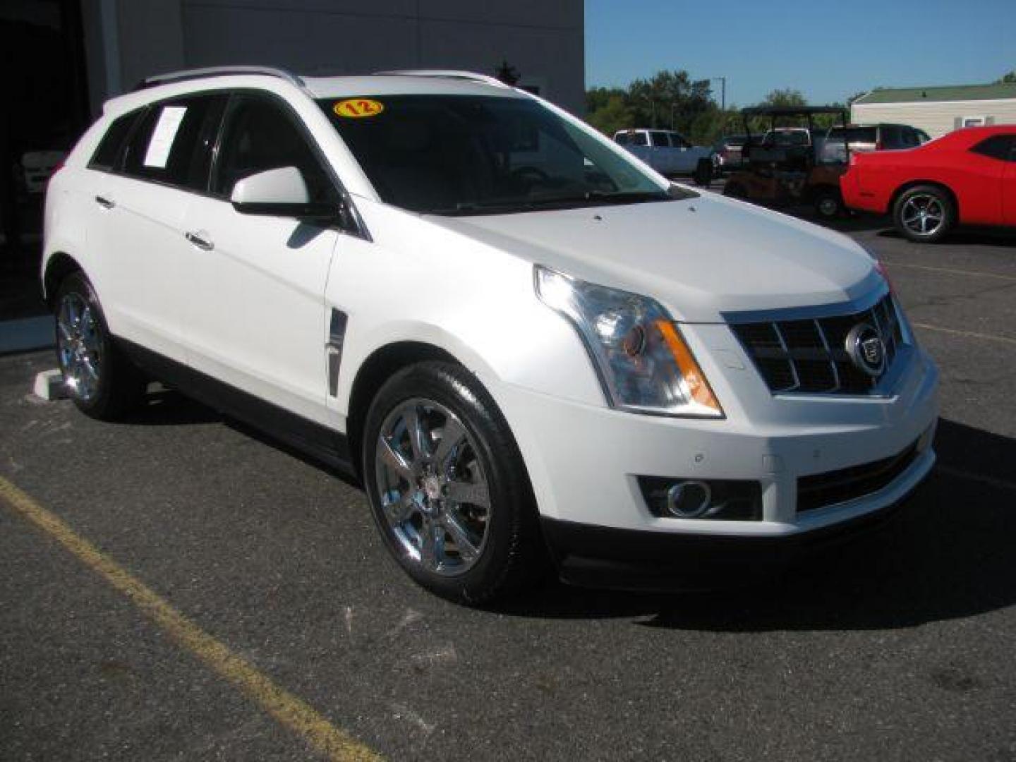 2012 White Cadillac SRX Performance (3GYFNBE32CS) with an 3.6L V6 DOHC 24V FFV engine, 6-Speed Automatic transmission, located at 2443 Albert Pike, Hot Springs, AR, 71913, (501) 623-6255, 34.492222, -93.109993 - LISTED FEATURES MAY BE OPTIONAL AND NOT INCLUDED ON THIS VEHICLE!!!- Photo#0