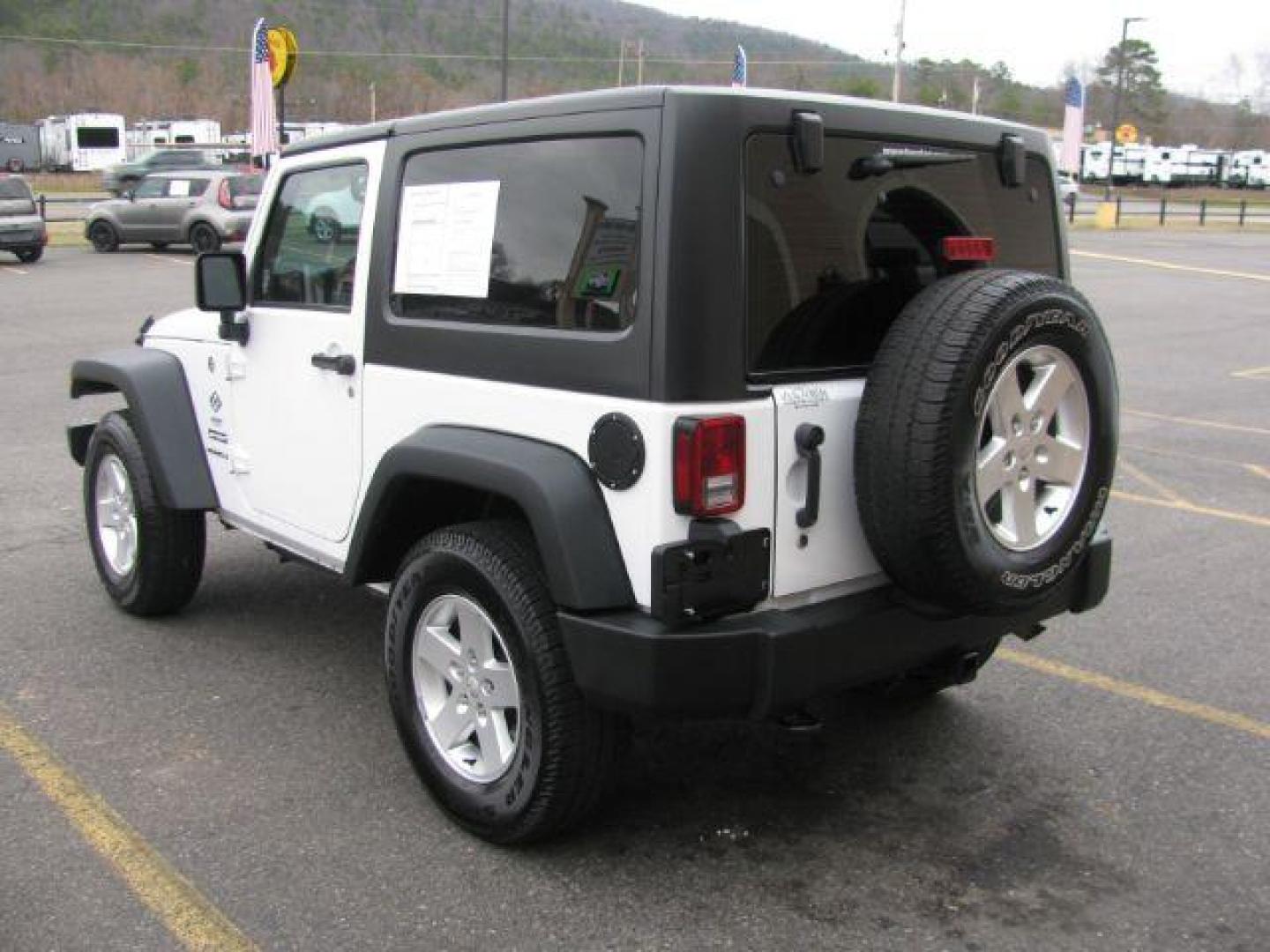 2016 White Jeep Wrangler Sport 4WD (1C4AJWAG3GL) with an 3.6L V6 DOHC 24V FFV engine, located at 2443 Albert Pike, Hot Springs, AR, 71913, (501) 623-6255, 34.492222, -93.109993 - LISTED FEATURES MAY BE OPTIONAL AND NOT INCLUDED ON THIS VEHICLE!!! - Photo#2