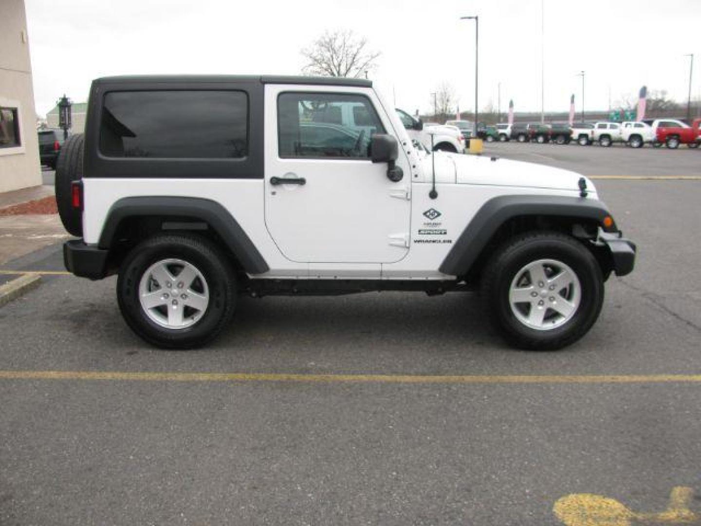 2016 White Jeep Wrangler Sport 4WD (1C4AJWAG3GL) with an 3.6L V6 DOHC 24V FFV engine, located at 2443 Albert Pike, Hot Springs, AR, 71913, (501) 623-6255, 34.492222, -93.109993 - LISTED FEATURES MAY BE OPTIONAL AND NOT INCLUDED ON THIS VEHICLE!!! - Photo#4