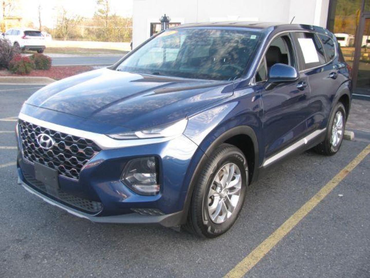 2019 Blue Hyundai Santa Fe SE 2.4 (5NMS23AD4KH) with an 2.4L L4 DOHC 16V engine, 8-Speed Automatic transmission, located at 2443 Albert Pike, Hot Springs, AR, 71913, (501) 623-6255, 34.492222, -93.109993 - LISTED FEATURES MAY BE OPTIONAL AND NOT INCLUDED ON THIS VEHICLE!!! - Photo#0