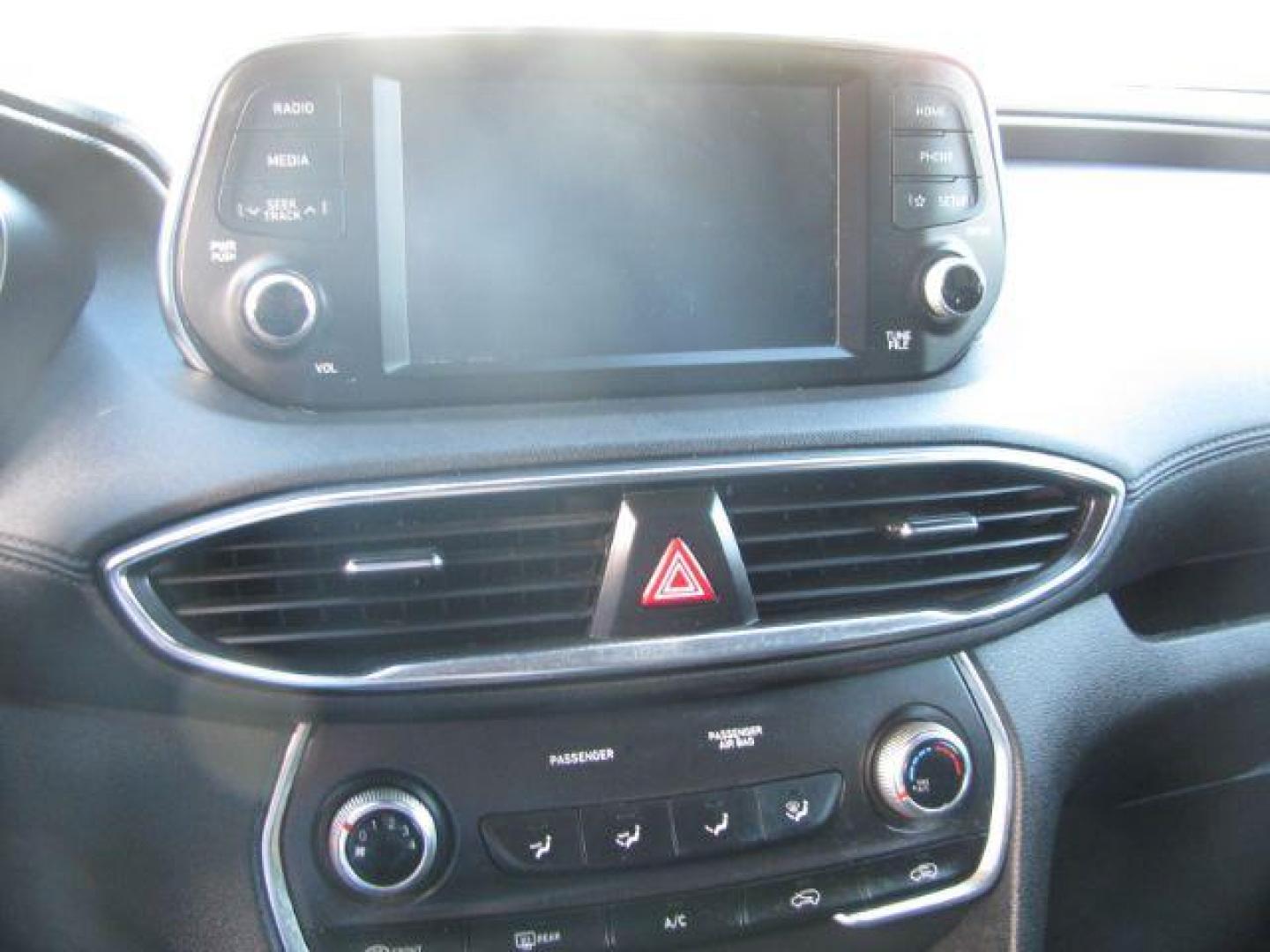 2019 Blue Hyundai Santa Fe SE 2.4 (5NMS23AD4KH) with an 2.4L L4 DOHC 16V engine, 8-Speed Automatic transmission, located at 2443 Albert Pike, Hot Springs, AR, 71913, (501) 623-6255, 34.492222, -93.109993 - LISTED FEATURES MAY BE OPTIONAL AND NOT INCLUDED ON THIS VEHICLE!!! - Photo#9