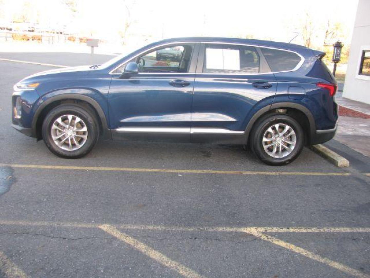2019 Blue Hyundai Santa Fe SE 2.4 (5NMS23AD4KH) with an 2.4L L4 DOHC 16V engine, 8-Speed Automatic transmission, located at 2443 Albert Pike, Hot Springs, AR, 71913, (501) 623-6255, 34.492222, -93.109993 - LISTED FEATURES MAY BE OPTIONAL AND NOT INCLUDED ON THIS VEHICLE!!! - Photo#1