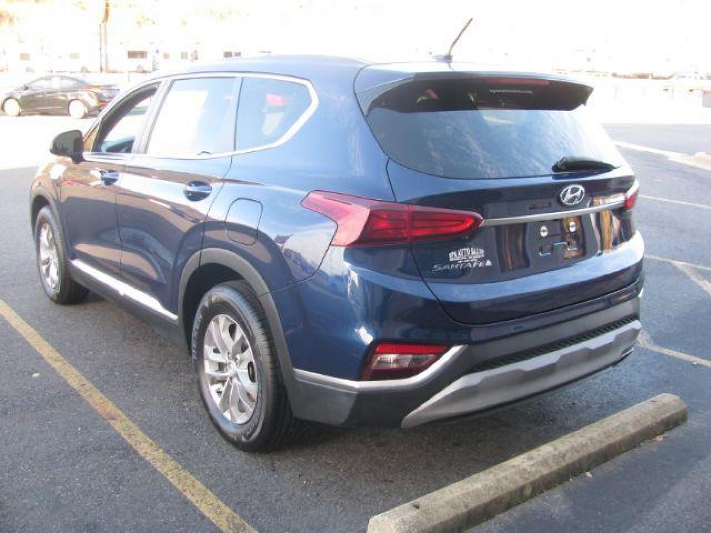 2019 Blue Hyundai Santa Fe SE 2.4 (5NMS23AD4KH) with an 2.4L L4 DOHC 16V engine, 8-Speed Automatic transmission, located at 2443 Albert Pike, Hot Springs, AR, 71913, (501) 623-6255, 34.492222, -93.109993 - LISTED FEATURES MAY BE OPTIONAL AND NOT INCLUDED ON THIS VEHICLE!!! - Photo#2