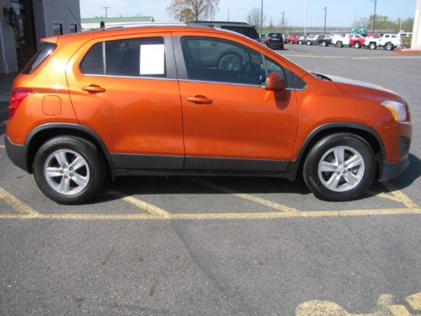 2015 Orange Chevrolet Trax LT FWD (KL7CJLSBXFB) with an 1.4L L4 DOHC 16V engine, 6-Speed Automatic transmission, located at 2443 Albert Pike, Hot Springs, AR, 71913, (501) 623-6255, 34.492222, -93.109993 - LISTED FEATURES MAY BE OPTIONAL AND NOT INCLUDED ON THIS VEHICLE!!! - Photo#1