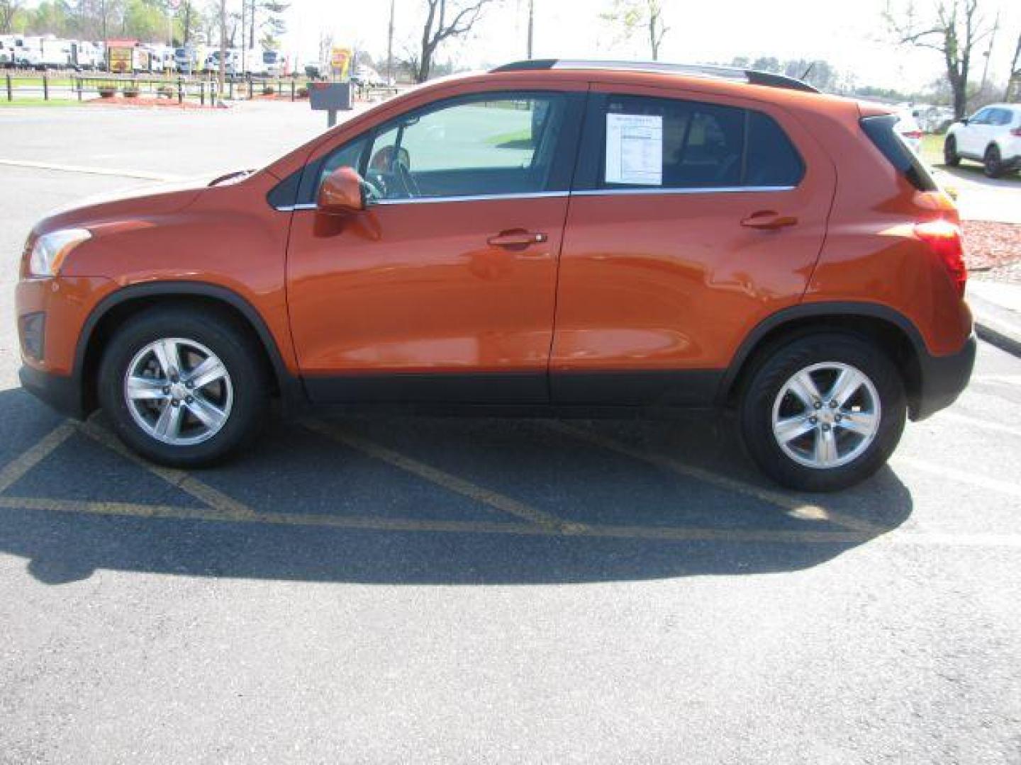 2015 Orange Chevrolet Trax LT FWD (KL7CJLSBXFB) with an 1.4L L4 DOHC 16V engine, 6-Speed Automatic transmission, located at 2443 Albert Pike, Hot Springs, AR, 71913, (501) 623-6255, 34.492222, -93.109993 - LISTED FEATURES MAY BE OPTIONAL AND NOT INCLUDED ON THIS VEHICLE!!! - Photo#4