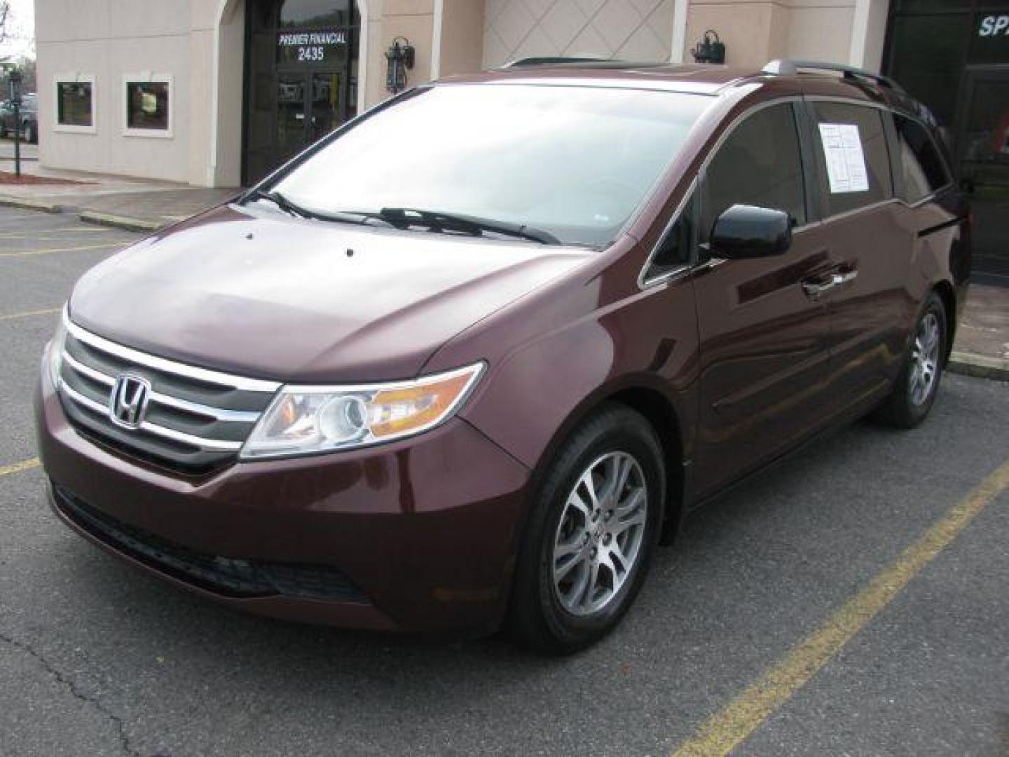 2012 Maroon Honda Odyssey EX-L (5FNRL5H63CB) with an 3.5L V6 SOHC 24V engine, 5-Speed Automatic transmission, located at 2443 Albert Pike, Hot Springs, AR, 71913, (501) 623-6255, 34.492222, -93.109993 - LISTED FEATURES MAY BE OPTIONAL AND NOT INCLUDED ON THIS VEHICLE!!! - Photo#0