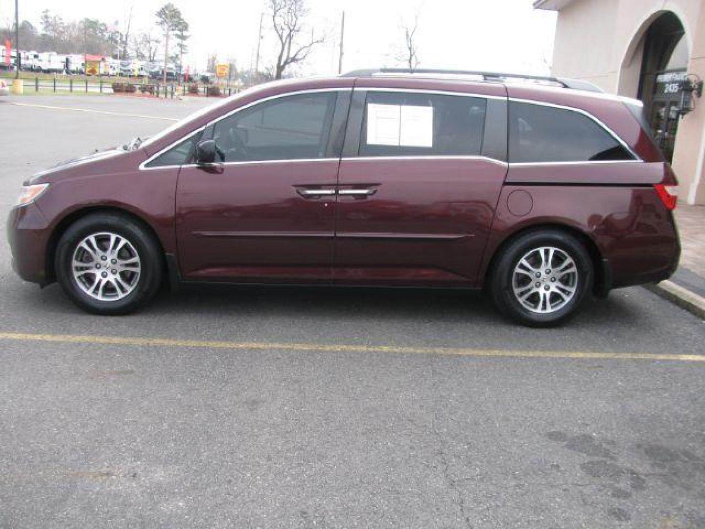 2012 Maroon Honda Odyssey EX-L (5FNRL5H63CB) with an 3.5L V6 SOHC 24V engine, 5-Speed Automatic transmission, located at 2443 Albert Pike, Hot Springs, AR, 71913, (501) 623-6255, 34.492222, -93.109993 - LISTED FEATURES MAY BE OPTIONAL AND NOT INCLUDED ON THIS VEHICLE!!! - Photo#1