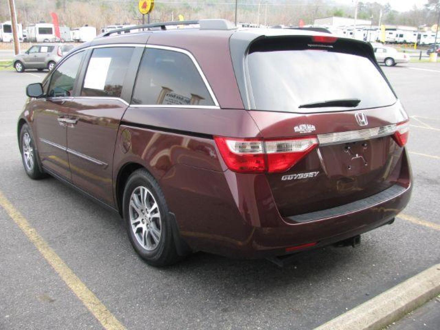 2012 Maroon Honda Odyssey EX-L (5FNRL5H63CB) with an 3.5L V6 SOHC 24V engine, 5-Speed Automatic transmission, located at 2443 Albert Pike, Hot Springs, AR, 71913, (501) 623-6255, 34.492222, -93.109993 - LISTED FEATURES MAY BE OPTIONAL AND NOT INCLUDED ON THIS VEHICLE!!! - Photo#2