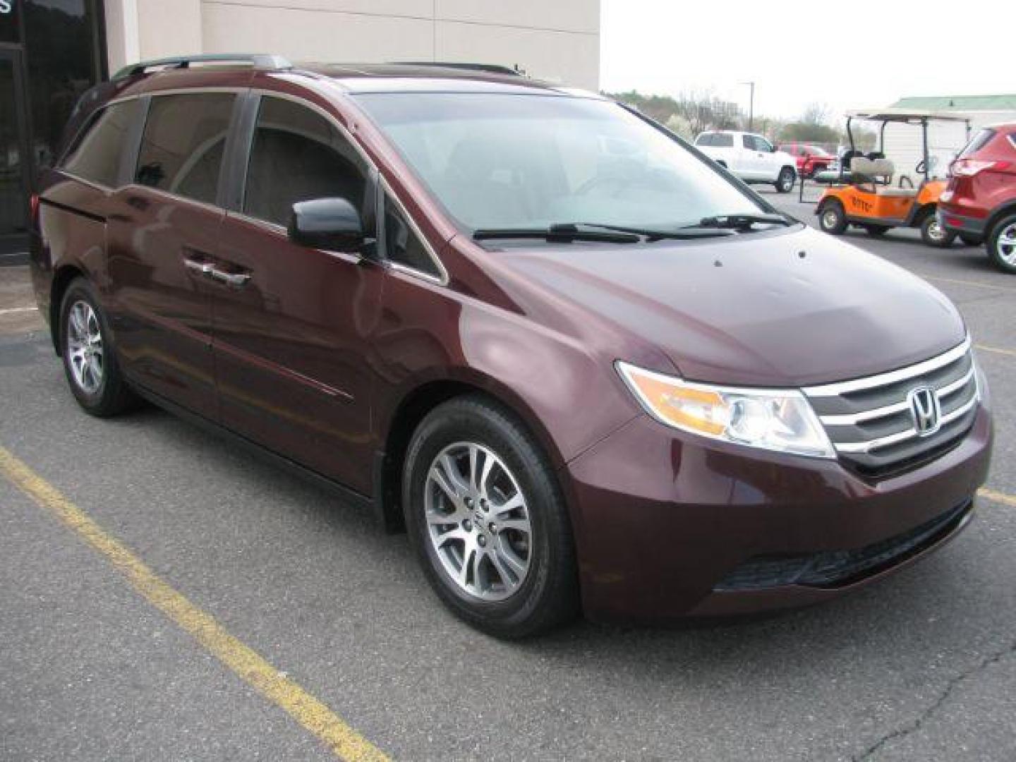 2012 Maroon Honda Odyssey EX-L (5FNRL5H63CB) with an 3.5L V6 SOHC 24V engine, 5-Speed Automatic transmission, located at 2443 Albert Pike, Hot Springs, AR, 71913, (501) 623-6255, 34.492222, -93.109993 - LISTED FEATURES MAY BE OPTIONAL AND NOT INCLUDED ON THIS VEHICLE!!! - Photo#5
