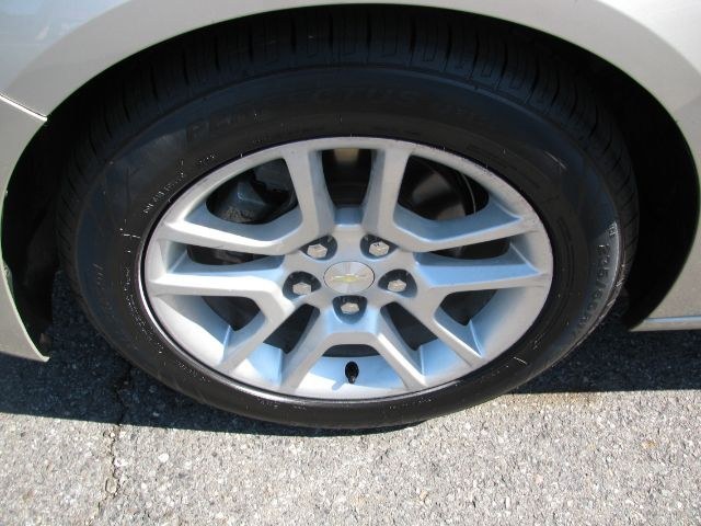 2015 Tan Chevrolet Malibu 1LT (1G11C5SL3FF) with an 2.5L L4 DOHC 16V engine, 6-Speed Automatic transmission, located at 2443 Albert Pike, Hot Springs, AR, 71913, (501) 623-6255, 34.492222, -93.109993 - ALL LISTED FEATURES MAY NOT BE INCLUDED!!!!!- Photo#6