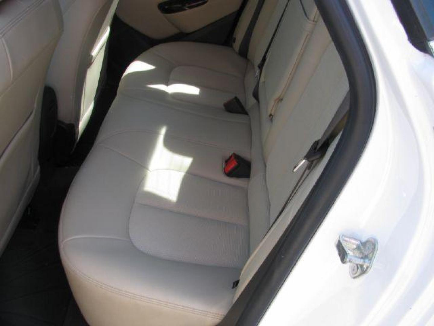 2015 White Buick Verano Base (1G4PP5SK7F4) with an 2.4L L4 DOHC 16V FFV engine, 6-Speed Automatic transmission, located at 2443 Albert Pike, Hot Springs, AR, 71913, (501) 623-6255, 34.492222, -93.109993 - Photo#7